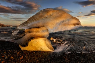 Stray iceberg on the Diamond Beach in the midnight sun.